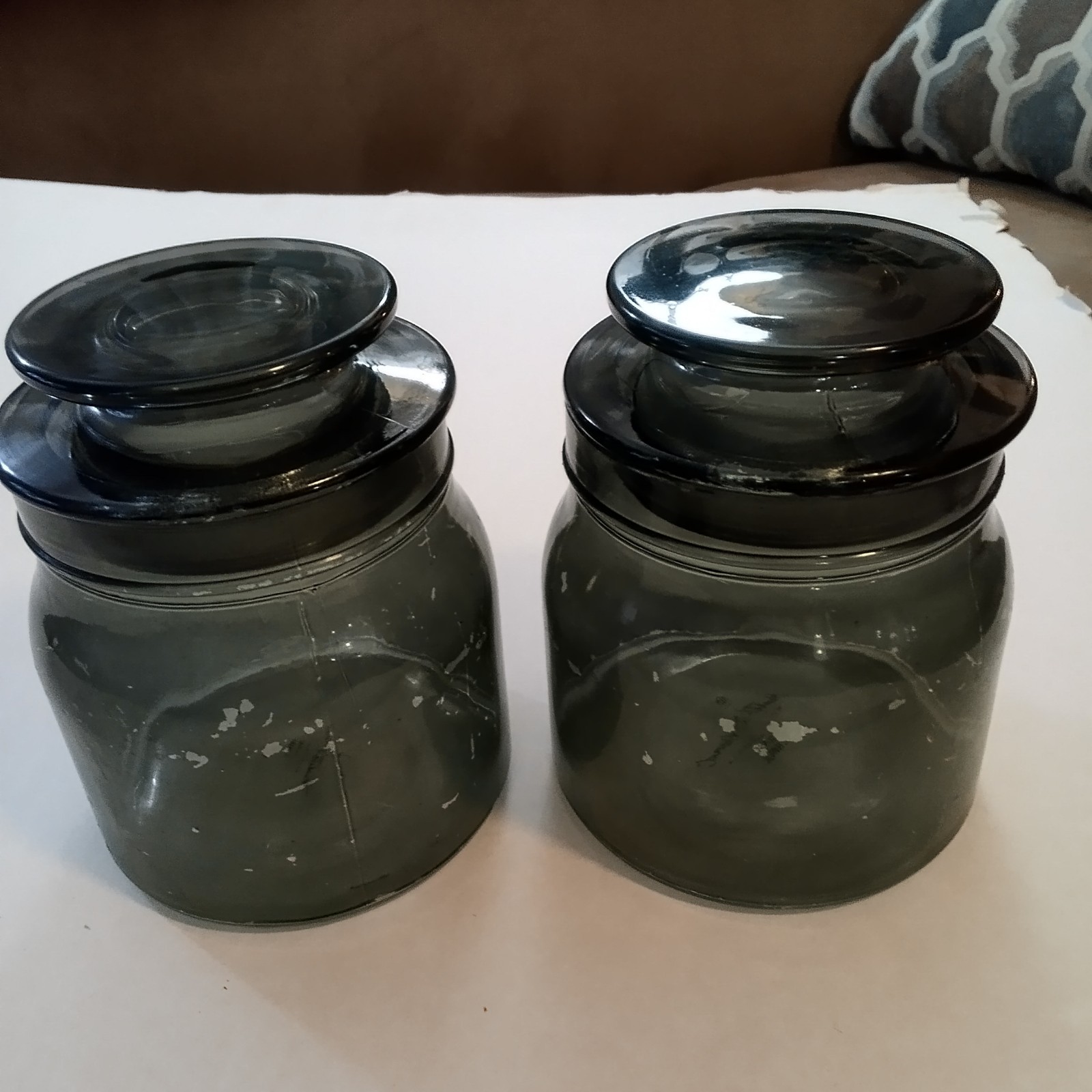 Two Matching Light Green Glass Canisters 5.5 In Tall Each Weighs Over 1 lb. Two Matching Light Green Glass Canisters 5.5 In Tall Each Weighs Over 1 lb.