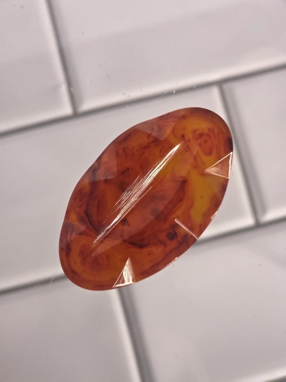 Vintage Orange Marbled Bakelite Carved Oval Jewelry Piece Vintage Orange Marbled Bakelite Carved Oval Jewelry Piece