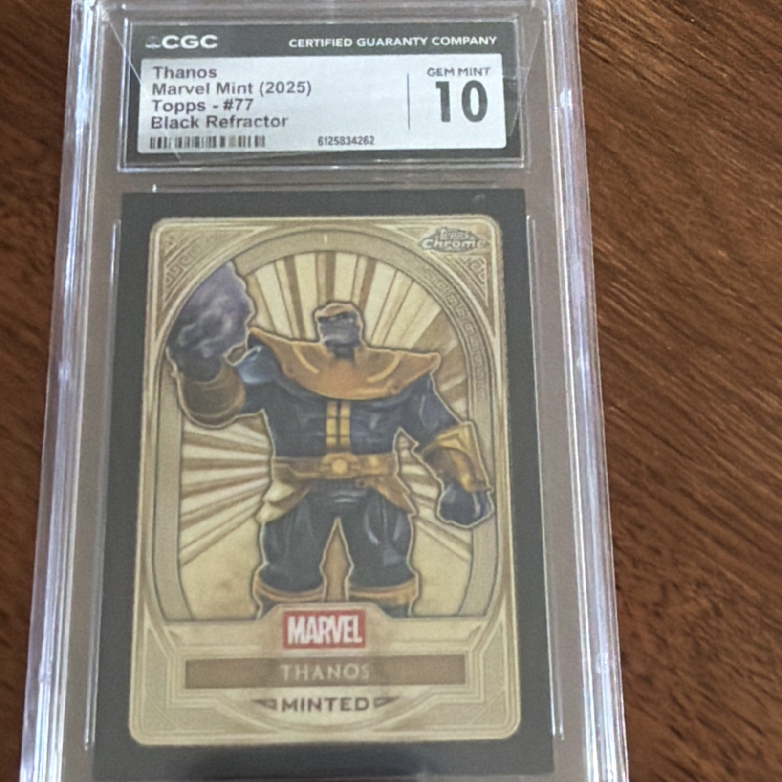 Thanos 2025 Topps Gold Card Marvel Minted Black Refractor /10 CGC 10 Thanos 2025 Topps Gold Card Marvel Minted Black Refractor /10 CGC 10