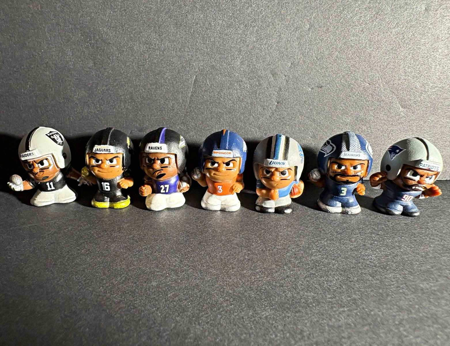 NFL Mini Plastic Football Player Figurines 7-Pack Mixed Teams NFL Mini Plastic Football Player Figurines 7-Pack Mixed Teams