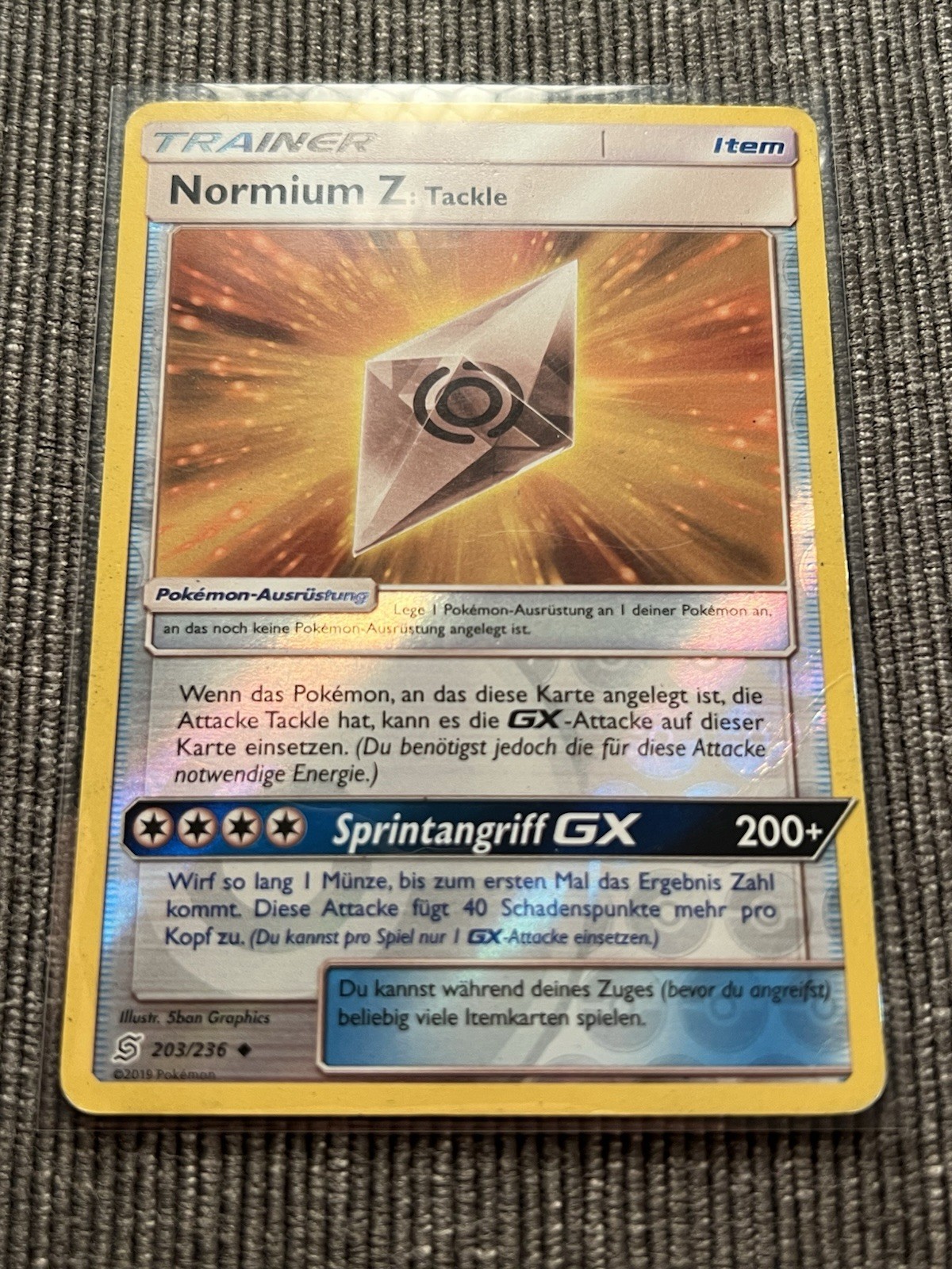 The Pokemon Company Pokemon TCG Normium Z: Tackle 203/236 German Holo GX 2019 The Pokemon Company Pokemon TCG Normium Z: Tackle 203/236 German Holo GX 2019