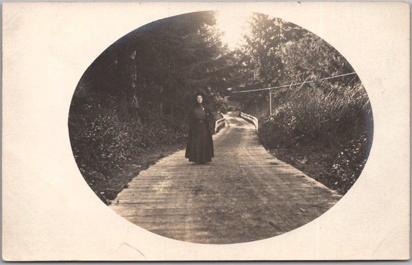 Vintage 1910s Real Photo RPPC Postcard / Woman in Black Dress Walking in Road Vintage 1910s Real Photo RPPC Postcard / Woman in Black Dress Walking in Road