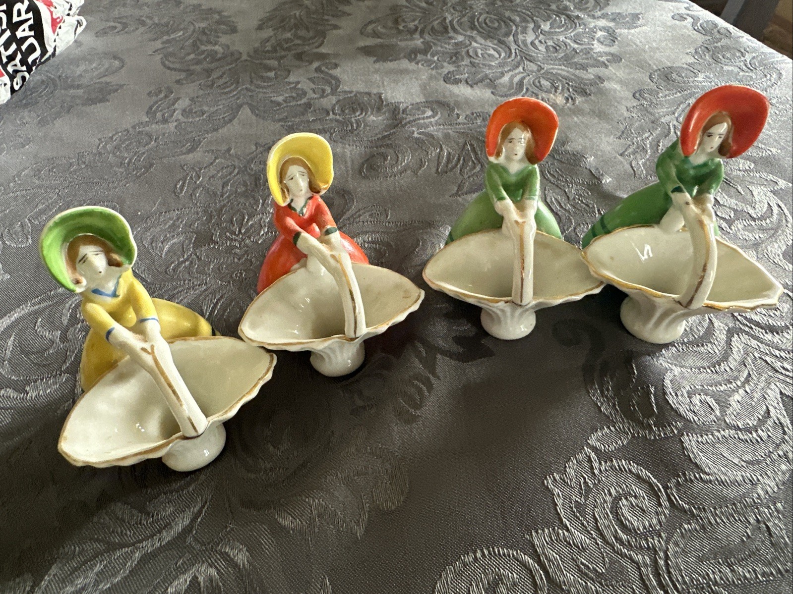 4 Vtg Japan Porcelain Girl W Hat Holds Basket Figurines ~ Orange/Green/Yellow 4 Vtg Japan Porcelain Girl W Hat Holds Basket Figurines ~ Orange/Green/Yellow