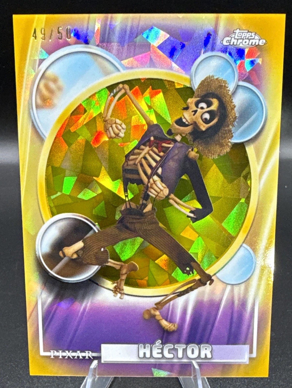 Topps 2026 Chrome Sapphire Gold Disney Pixar Coco Héctor #124 Parallel 49/50