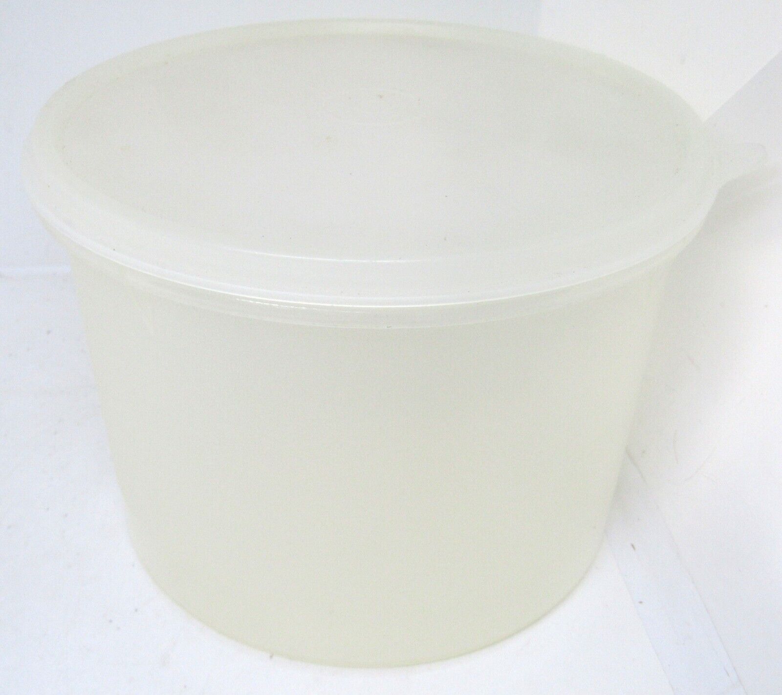 Tupperware Clear Round Lidded Storage Container. Measures 5\