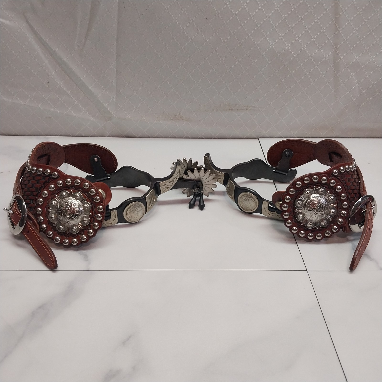 Pair of Ornate Spurs leather and steel