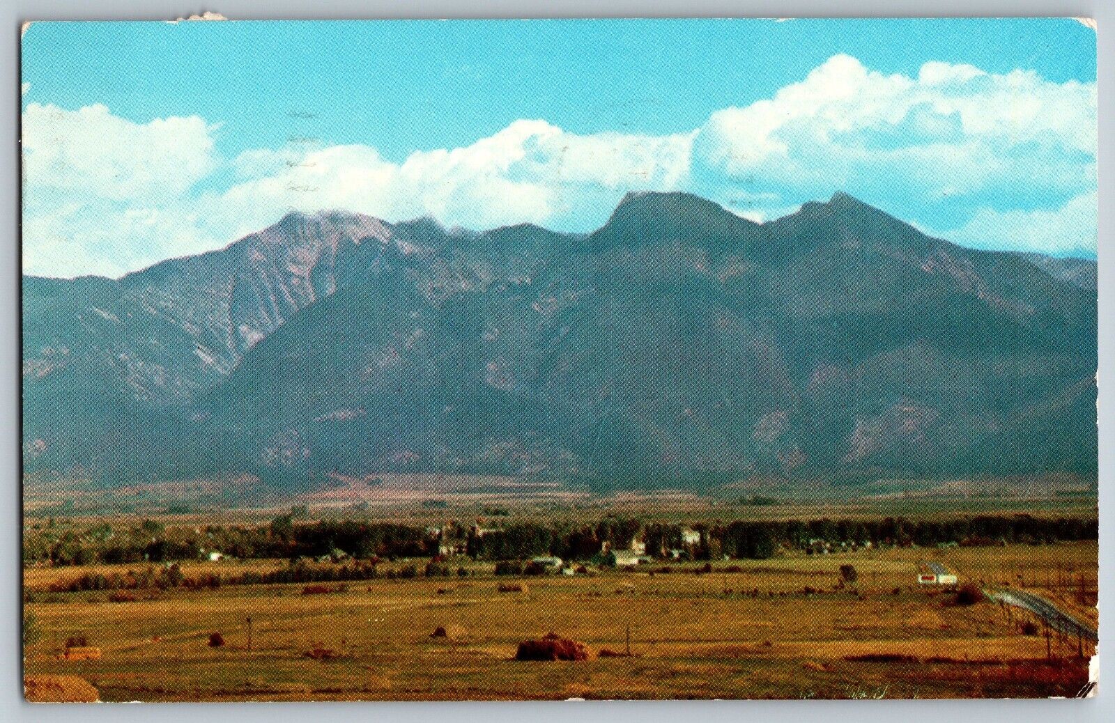 Montana MT - St. Ignatius Mission Mountain Range - Vintage Postcard - Posted