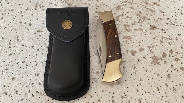 Buck 110USA Hunting Pocket Knife Lockback Ebony Wood Handle Plain Blade W/Leathe Buck 110USA Hunting Pocket Knife Lockback Ebony Wood Handle Plain Blade W/Leathe