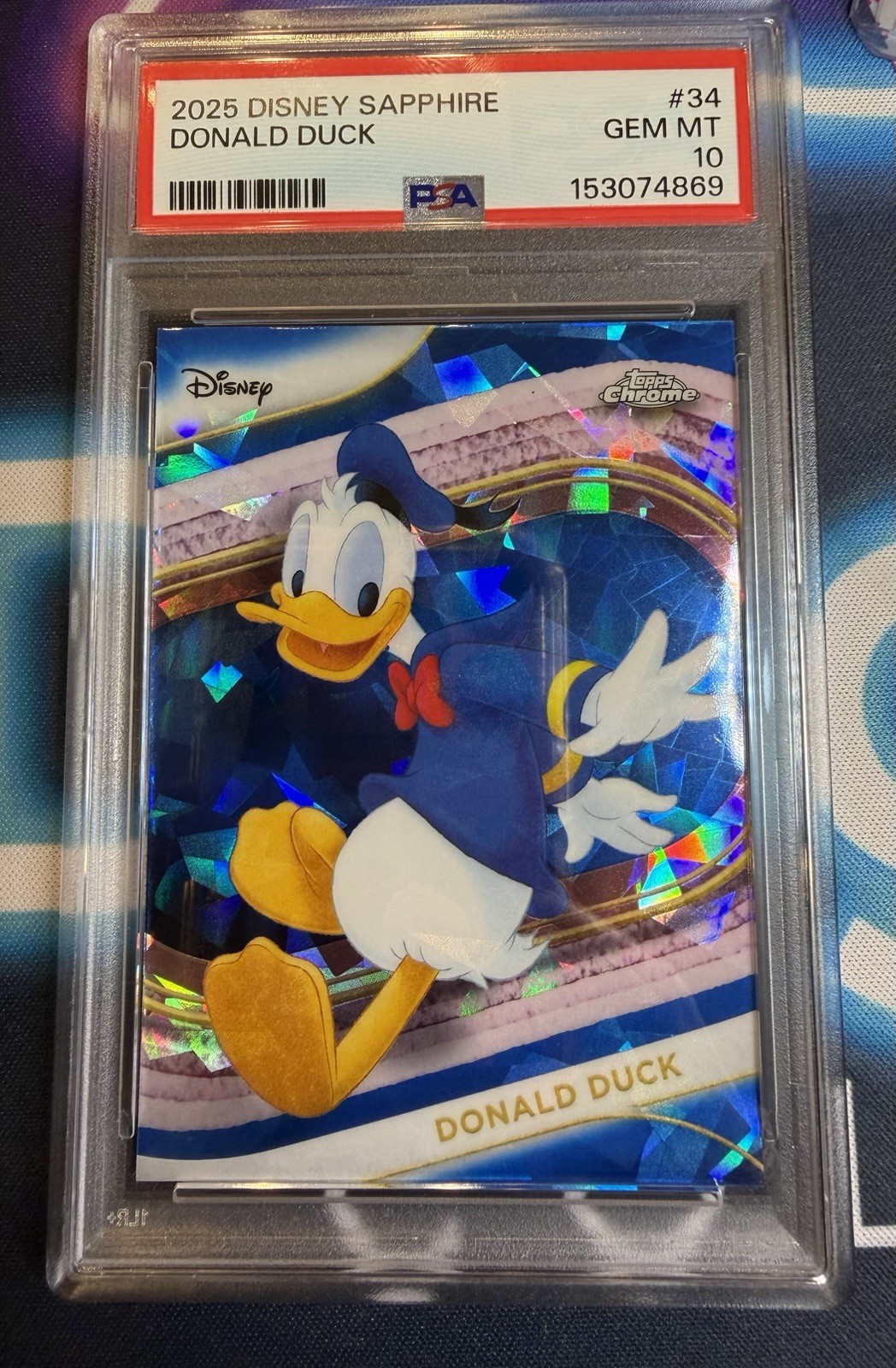 2025 Topps Chrome Sapphire Disney Donald Duck PSA 10