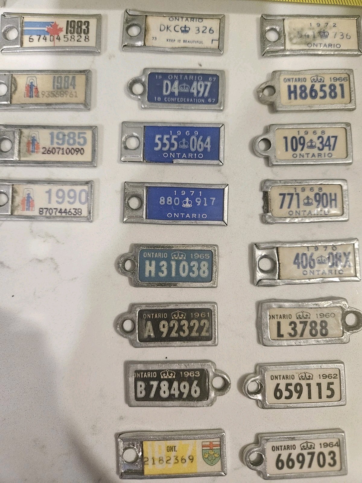 20 Vintage War Amps Canada Ontario Licence Plate Key Tags 1960-1990 Lot 20 Vintage War Amps Canada Ontario Licence Plate Key Tags 1960-1990 Lot