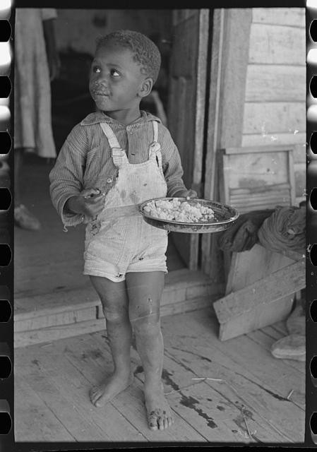 Photo:Southeast Missouri 1938 Sharecropper Child Holding Plate Photo:Southeast Missouri 1938 Sharecropper Child Holding Plate