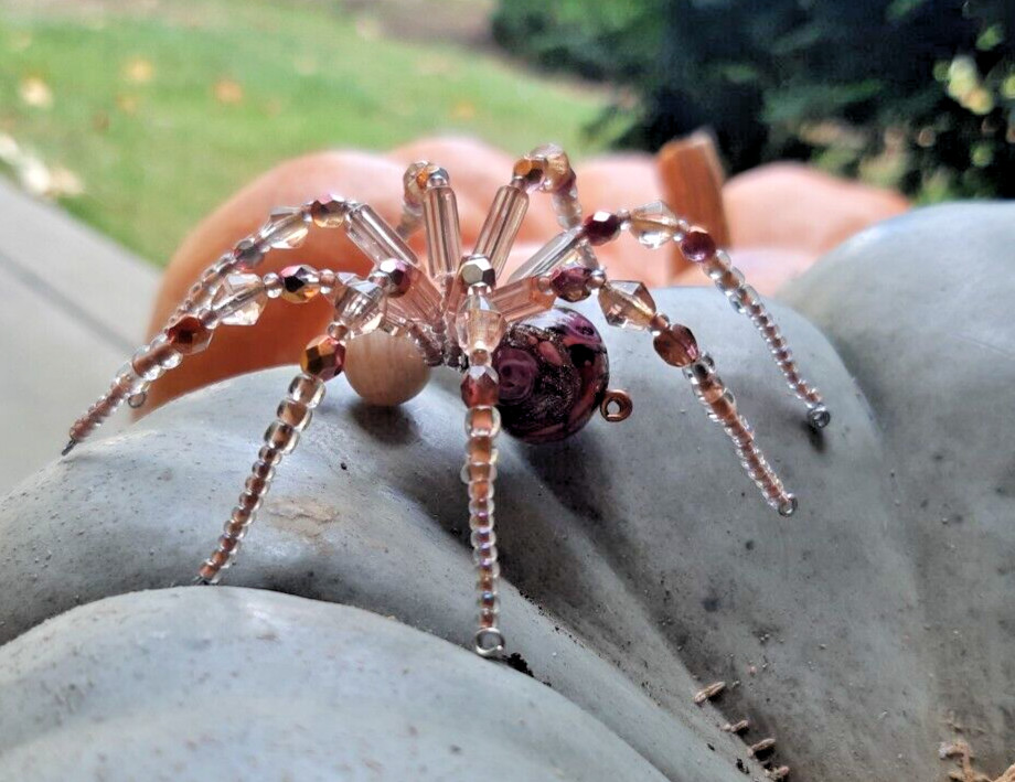Cute Pastel Pink Spider with Unusual Marbled bead. Cute Pastel Pink Spider with Unusual Marbled bead.