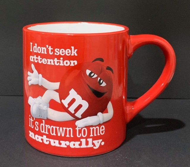 Nice Red M&M Coffee Mug “I Don't Seek Attention It's Drawn To Me Naturally”