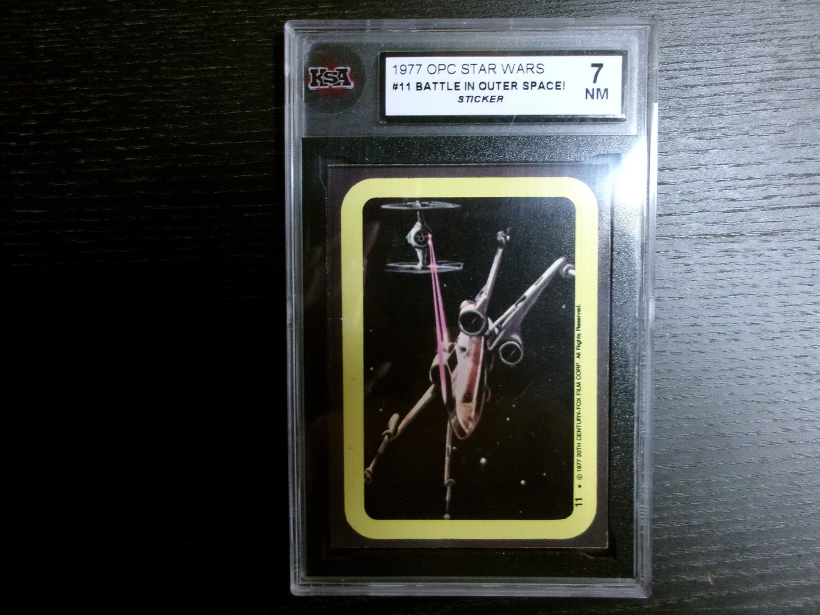 1977 STAR WARS Sticker #11 Battle In Outer Space KSA 7 (PSA 7/APR $450) N-MINT💎