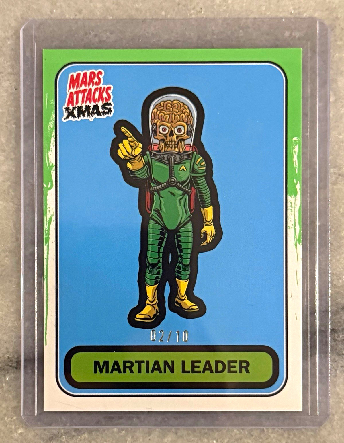 2026 Topps Mars Attacks Xmas Martian Leader Green /10 B-57 SSP 2026 Topps Mars Attacks Xmas Martian Leader Green /10 B-57 SSP