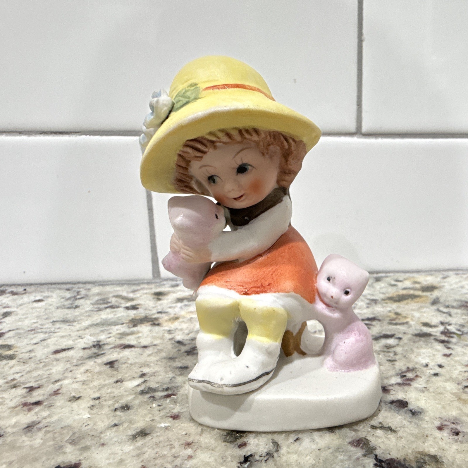 Vintage porcelain figurine of a young girl Vintage porcelain figurine of a young girl