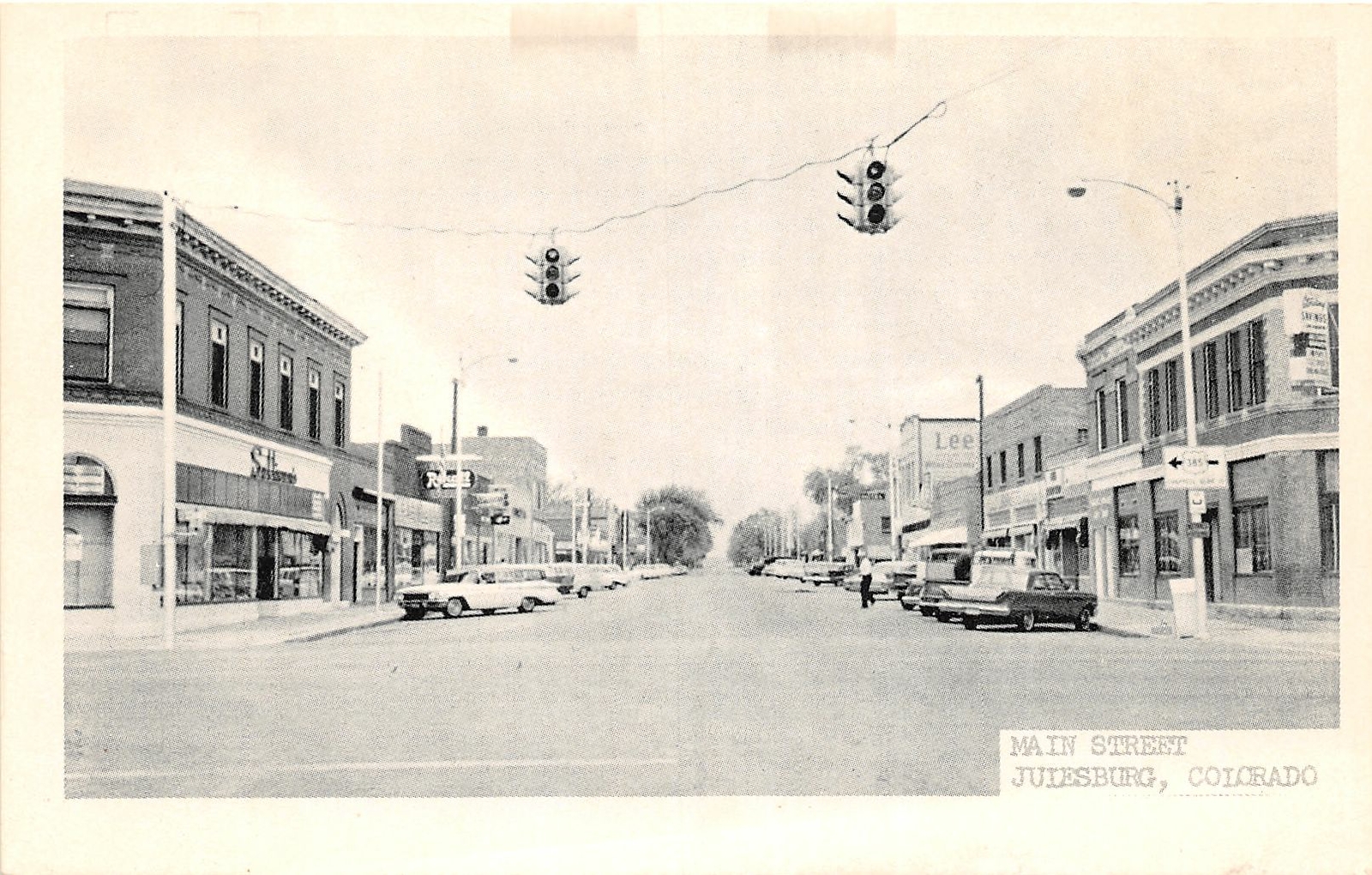 H60/ Julesburg Colorado Postcard c1940s Main Street Stores Automobiles 1 H60/ Julesburg Colorado Postcard c1940s Main Street Stores Automobiles 1