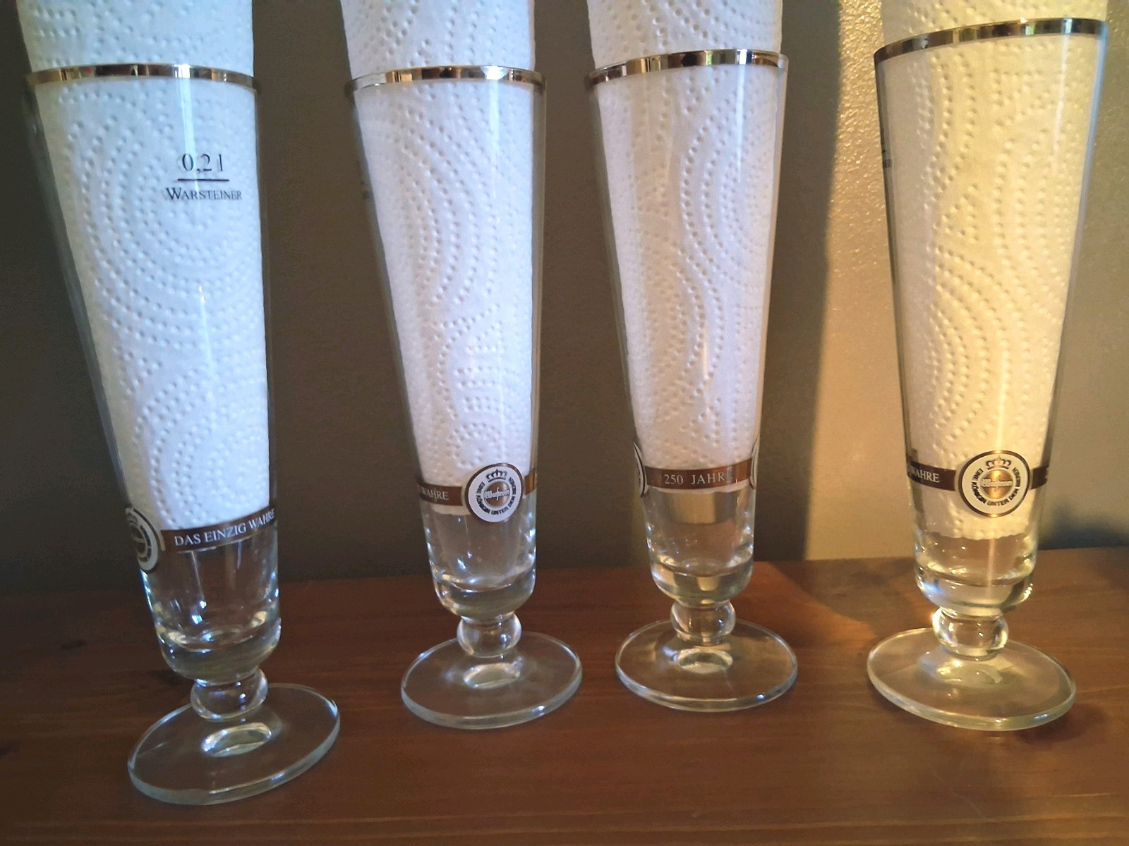 Warsteiner Bruere 4 pc Pilsner Clear Glass Footed Vintage Black and Gold Trim Warsteiner Bruere 4 pc Pilsner Clear Glass Footed Vintage Black and Gold Trim