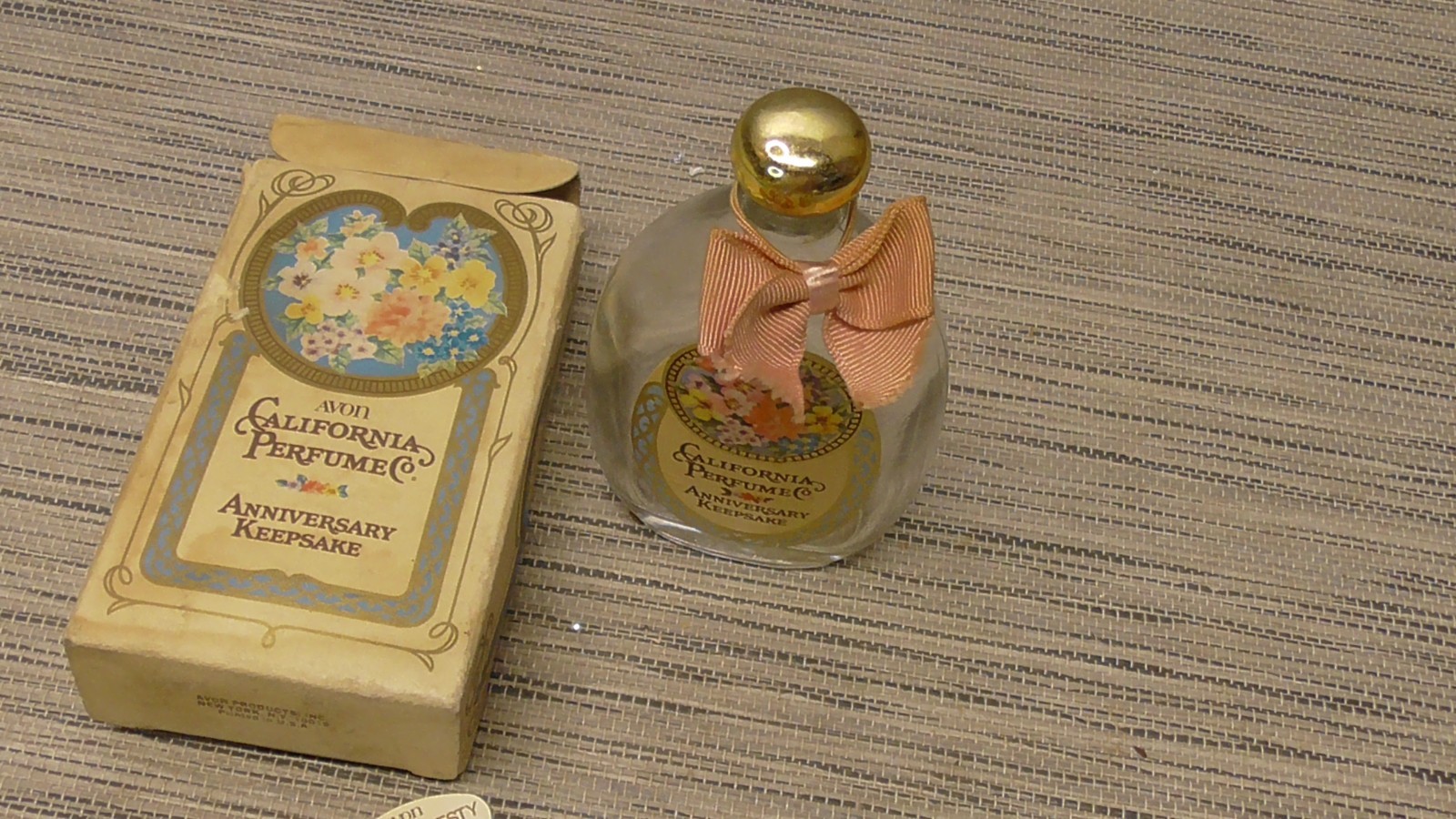 Vtg Avon California Perfume Anniversary Keepsake Charisma Cologne bottle in box Vtg Avon California Perfume Anniversary Keepsake Charisma Cologne bottle in box