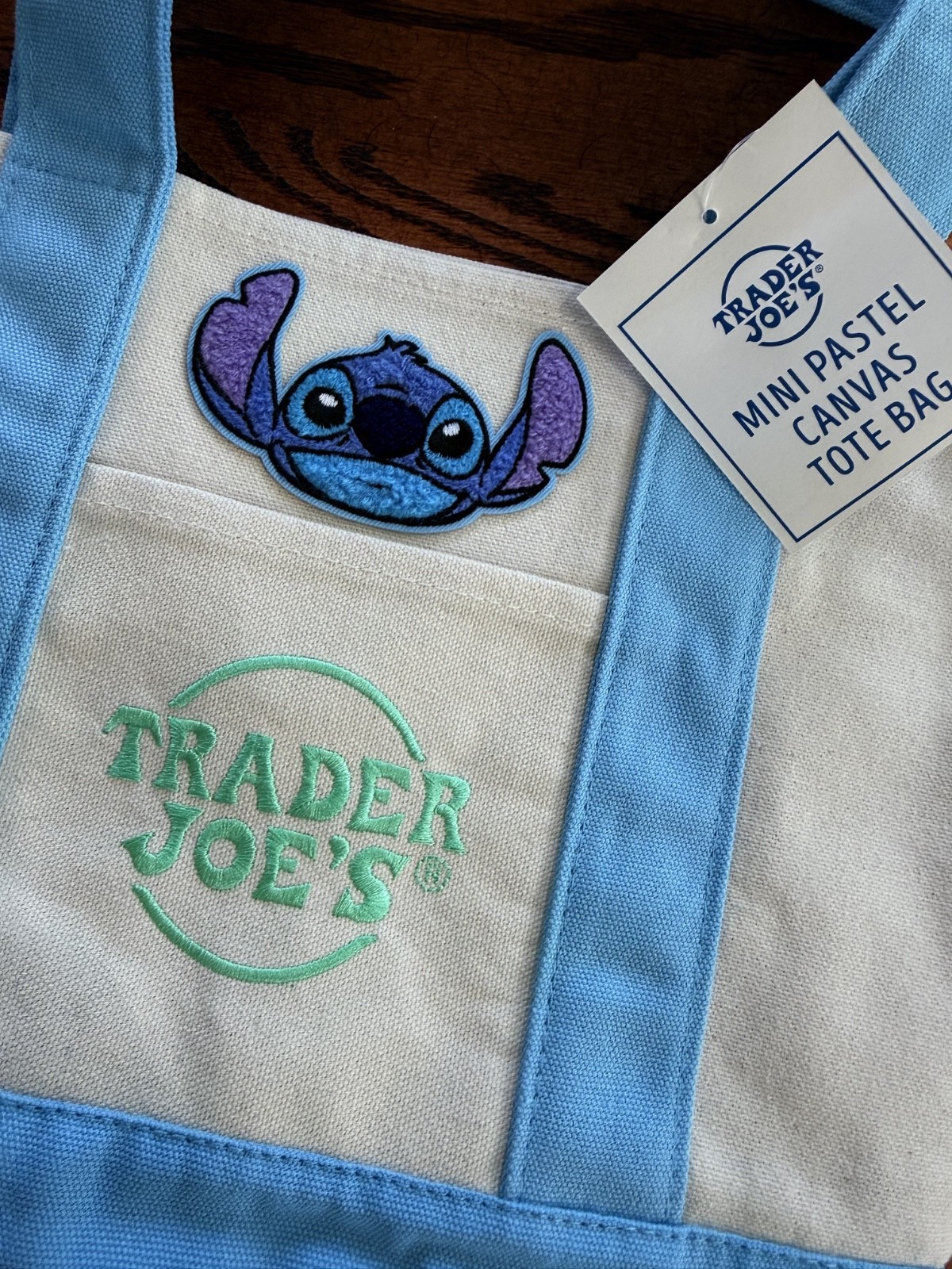 NEW blue Trader Joe's mini tote bag customized Disney Stitch patch Easter NWT NEW blue Trader Joe's mini tote bag customized Disney Stitch patch Easter NWT