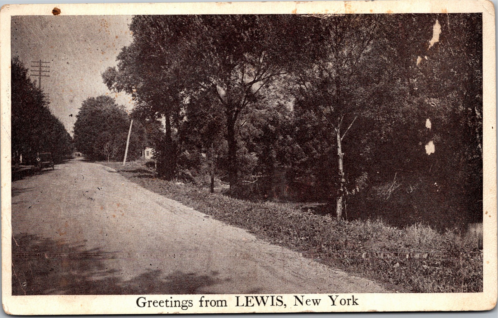 Postcard NY Lewis Greetings from Street Scene 1924 AMP photo brown landscapes