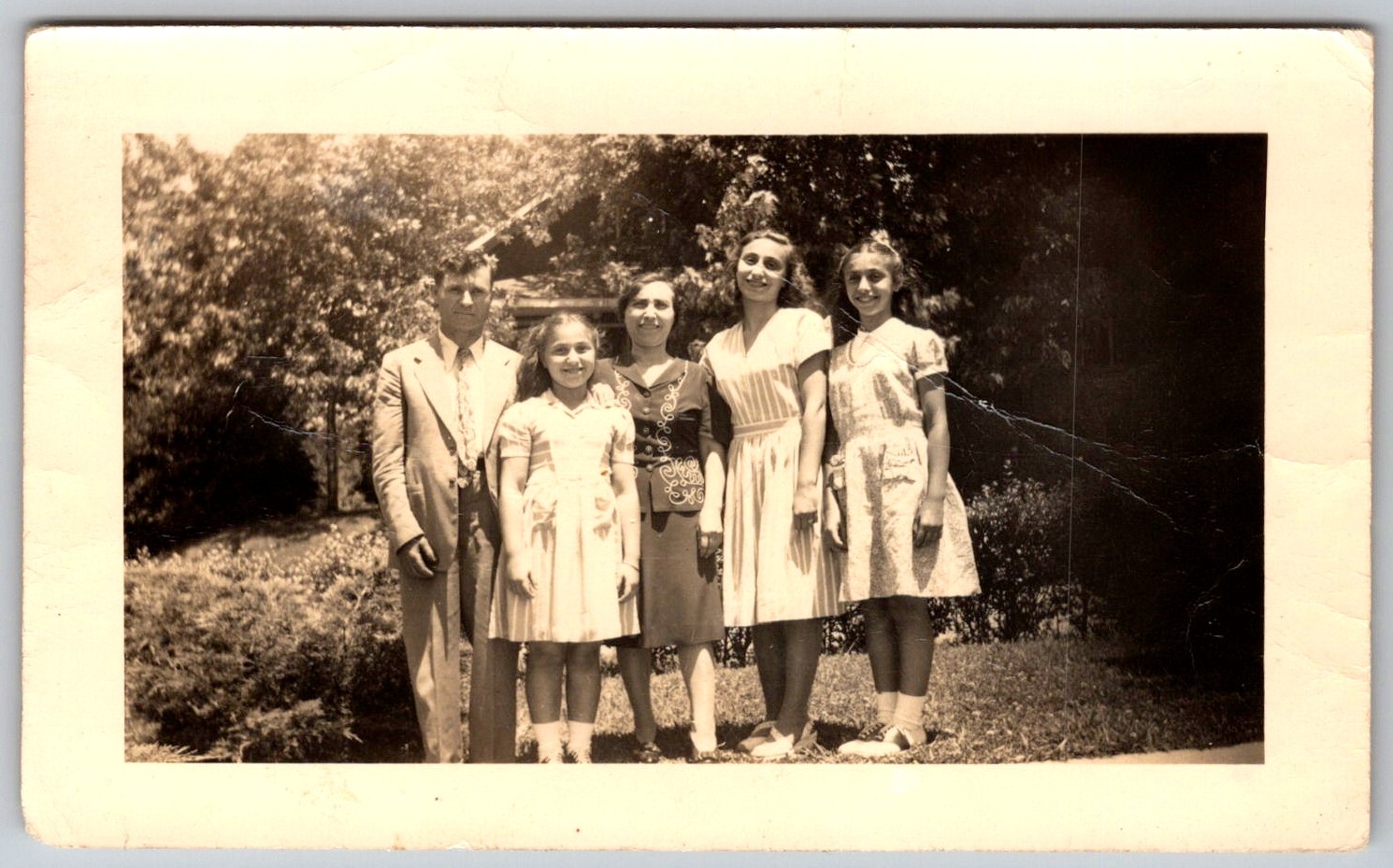 Vtg B&W Snapshot Family Portrait Parents Three Daughters Garden Yard Dresses