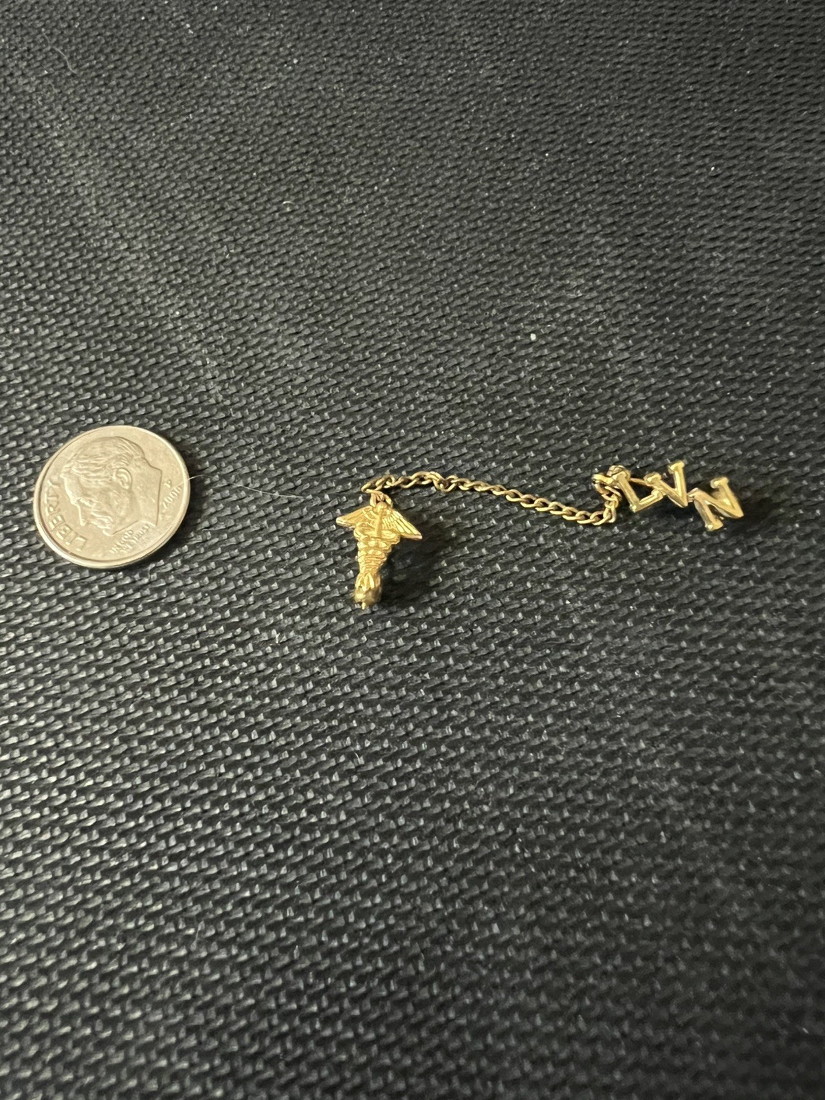 Vintage 10K Gold Vintage LVN pin with chain