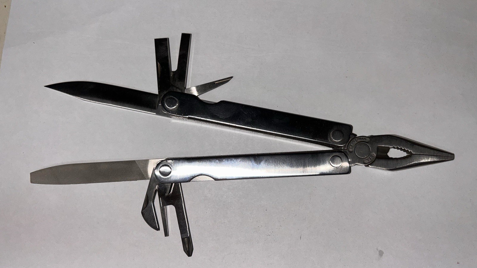 Vintage Pre-1992 (No Date Stamp) Leatherman PST Multi-Tool with Leather Pouch Vintage Pre-1992 (No Date Stamp) Leatherman PST Multi-Tool with Leather Pouch