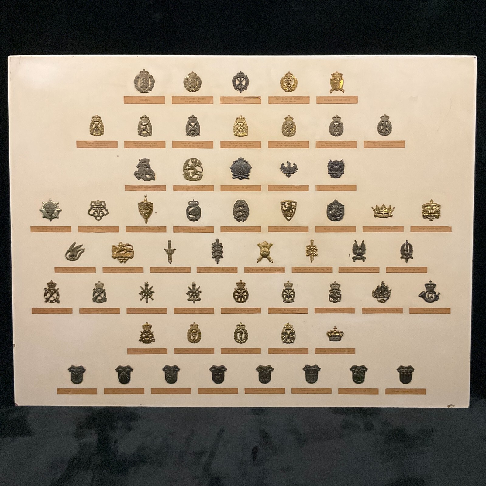 Collection of 56 Antique WWI & WWII Royal Danish Military Badges on the Board Collection of 56 Antique WWI & WWII Royal Danish Military Badges on the Board