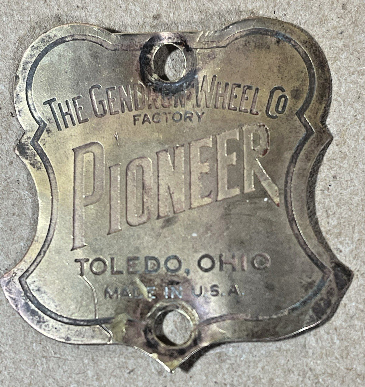 Vintage The Gendron Wheel Co. PIONEER Head Badge Tag Emblem Toledo, OH. Vintage The Gendron Wheel Co. PIONEER Head Badge Tag Emblem Toledo, OH.