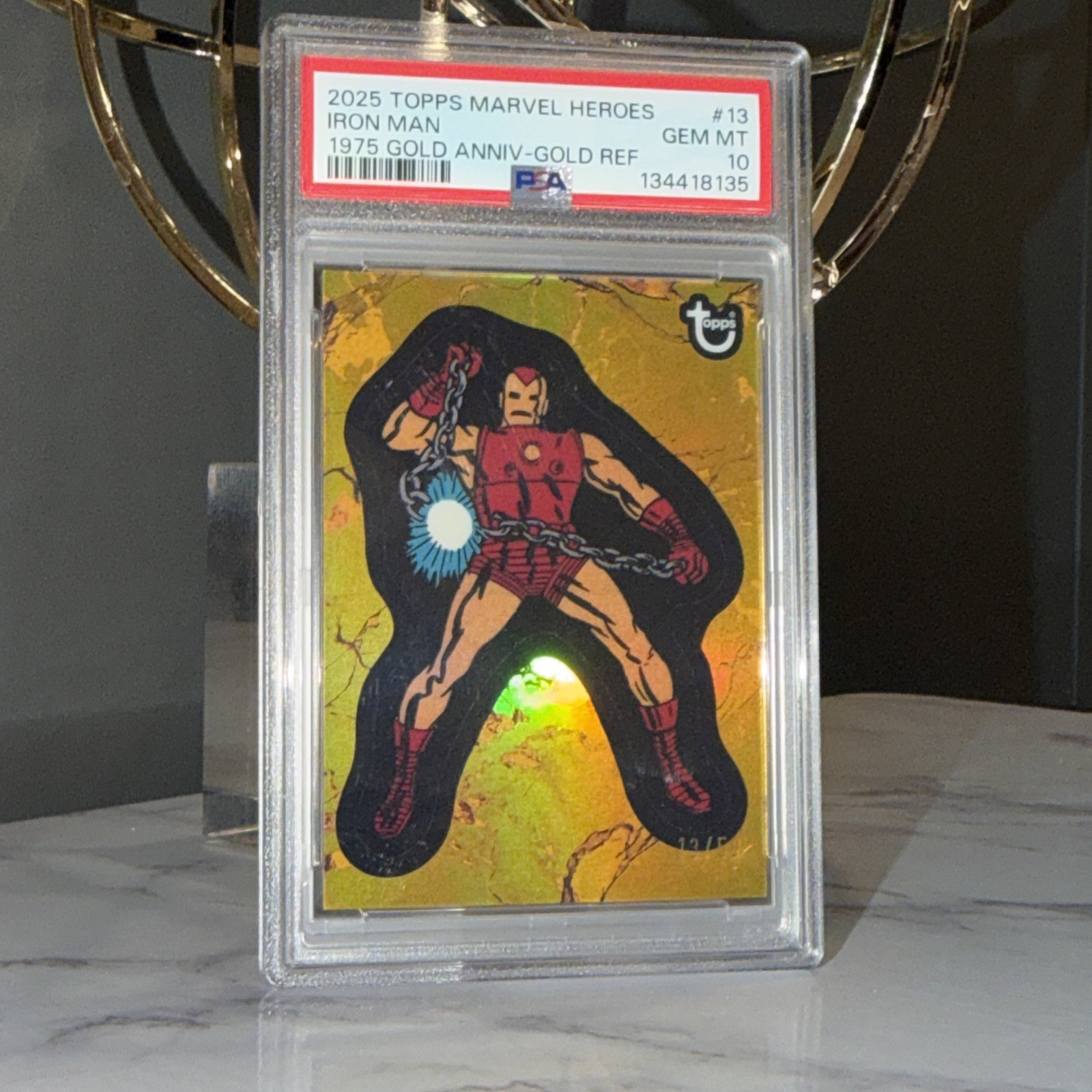 Topps 2025 Marvel Heroes Iron Man #13 1975 Gold Anniv Gold Refractor PSA 10 /50 Topps 2025 Marvel Heroes Iron Man #13 1975 Gold Anniv Gold Refractor PSA 10 /50