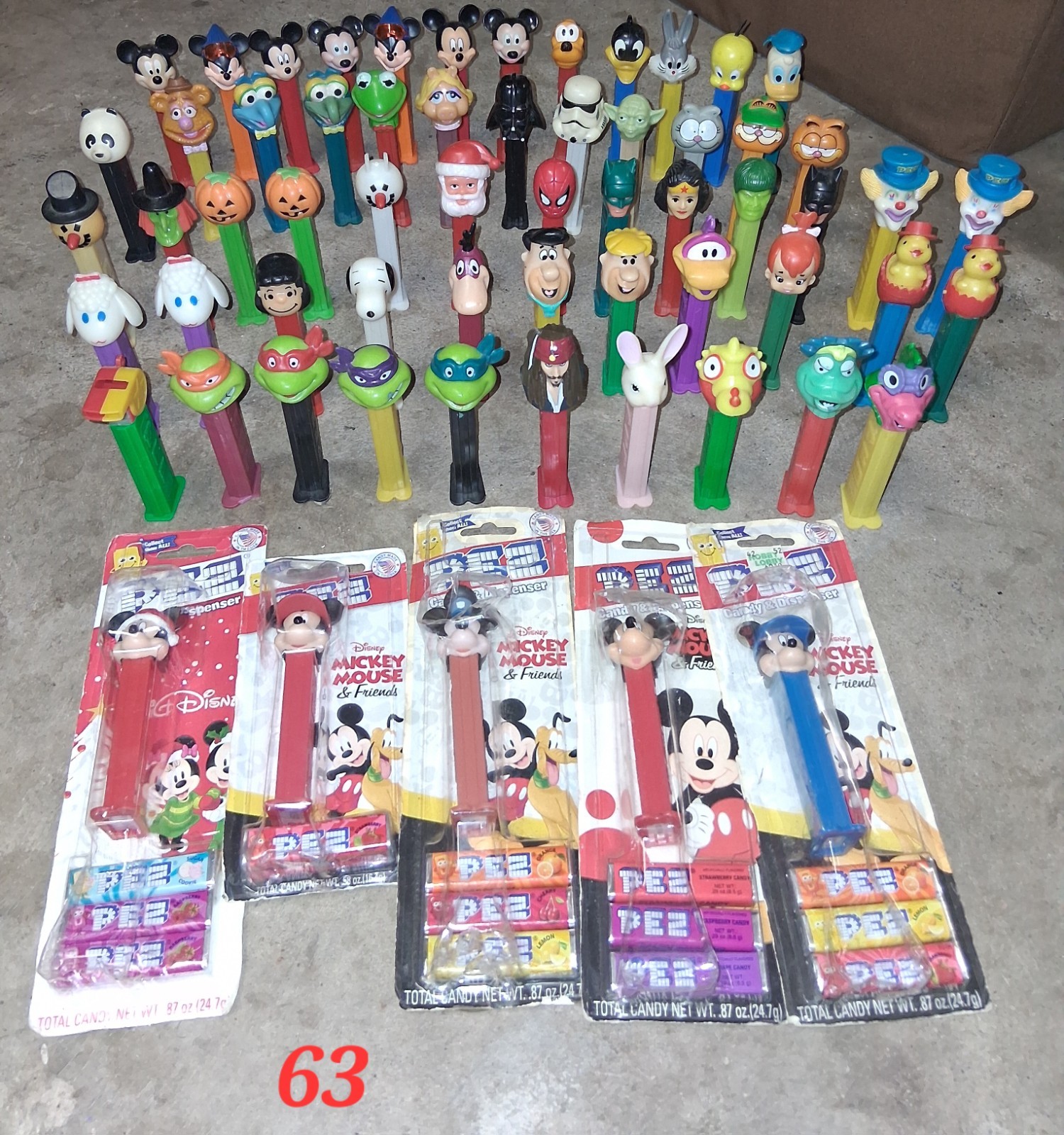 Lot Of 63 PEZ Dispensers With Feet Cartoons, Action Heroes, Holiday Characters Lot Of 63 PEZ Dispensers With Feet Cartoons, Action Heroes, Holiday Characters