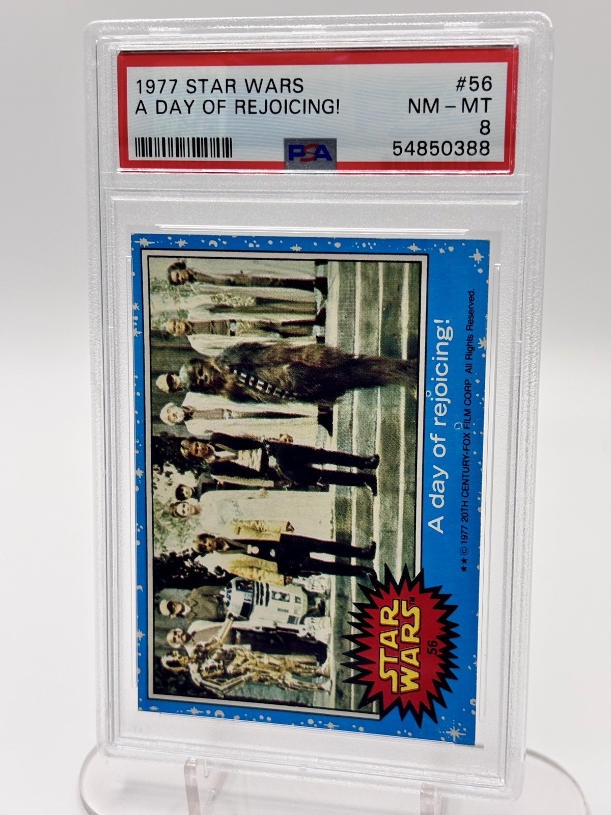 1977 TOPPS STAR WARS CARD #56 A DAY OF REJOICING PSA 8 1977 TOPPS STAR WARS CARD #56 A DAY OF REJOICING PSA 8