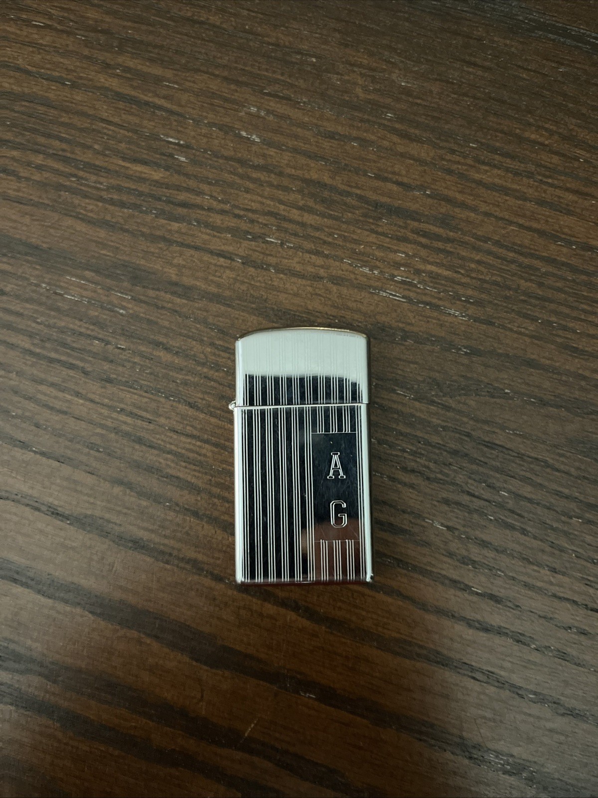 🔥 Vintage Zippo slim Lighter striped Polished Chrome U.S.A. Personalized “A G” 🔥 Vintage Zippo slim Lighter striped Polished Chrome U.S.A. Personalized “A G”