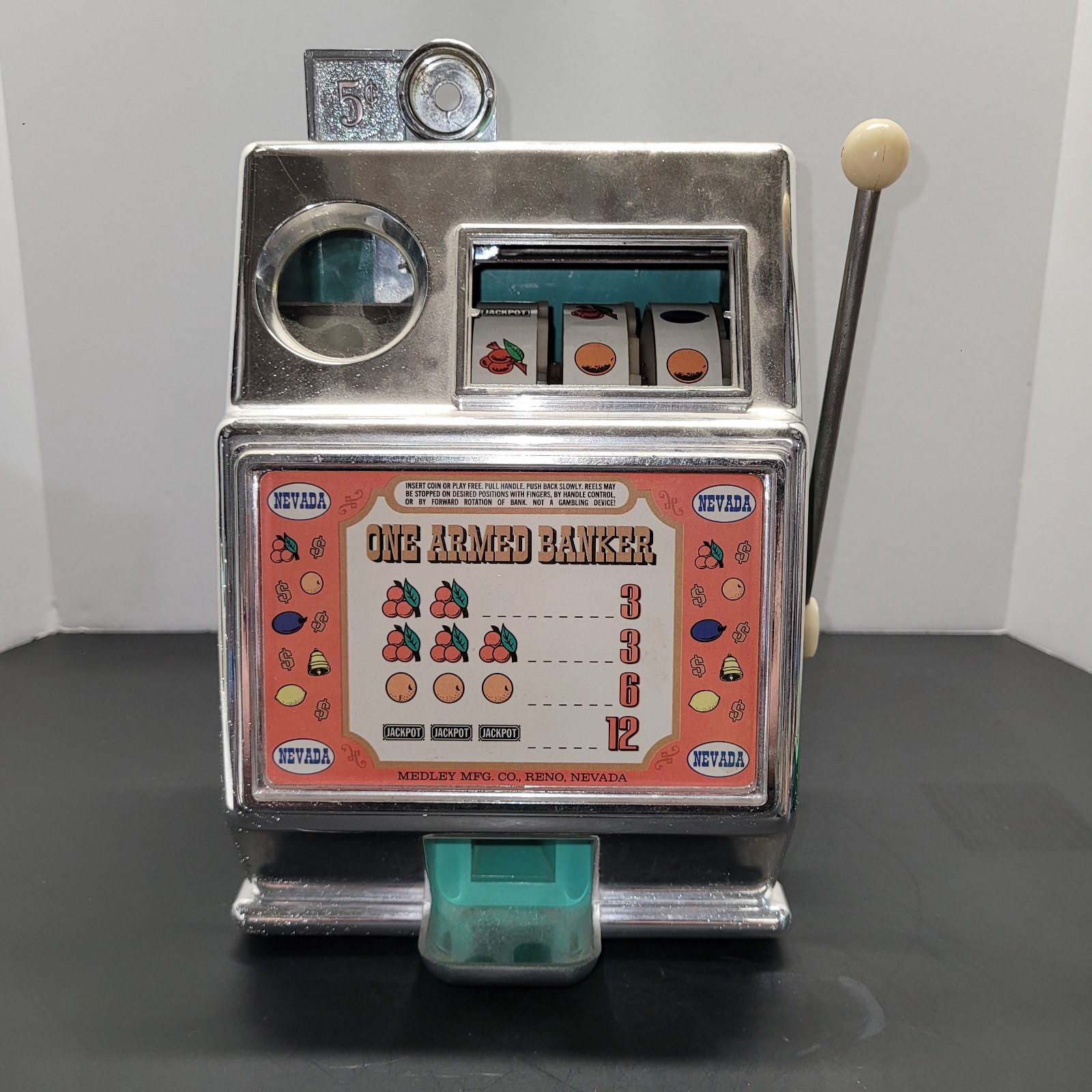 Medley MFG “One Armed Banker” Novelty Slot Machine Carousel Industries READ Medley MFG “One Armed Banker” Novelty Slot Machine Carousel Industries READ