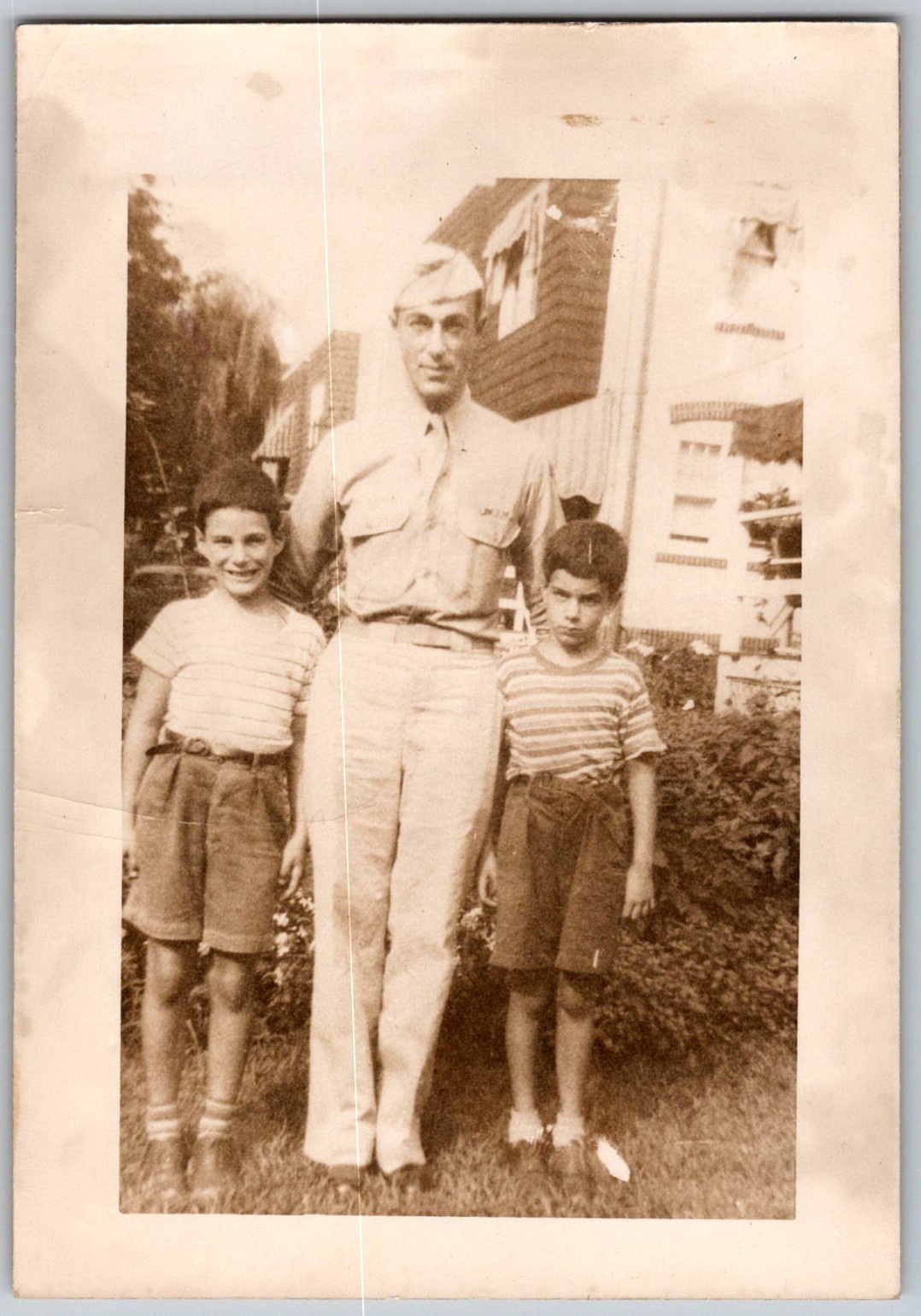 Vtg B&W Snapshot WWII Soldier Army Uniform Two Boys Striped Shirts Yard 1940s