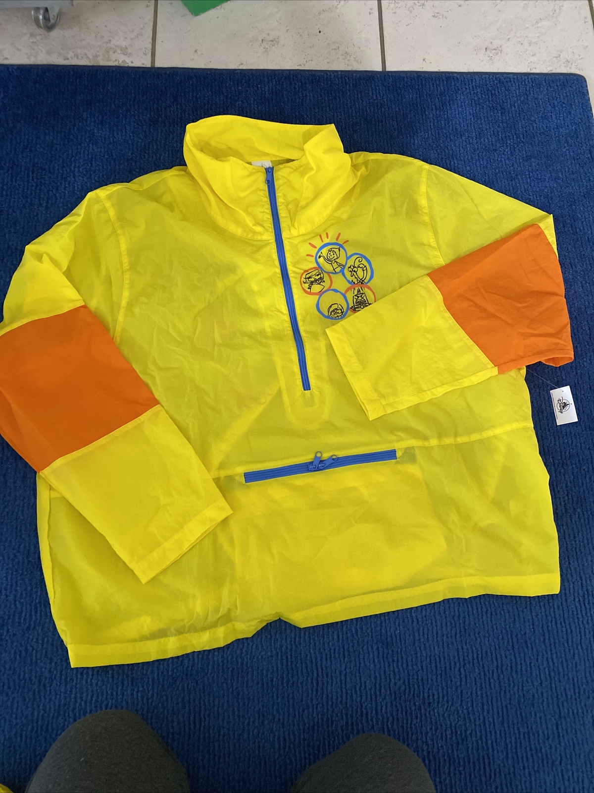 Disney Parks Pixar “Inside Out’ Windbreaker yellow size Adult 1XL NWT
