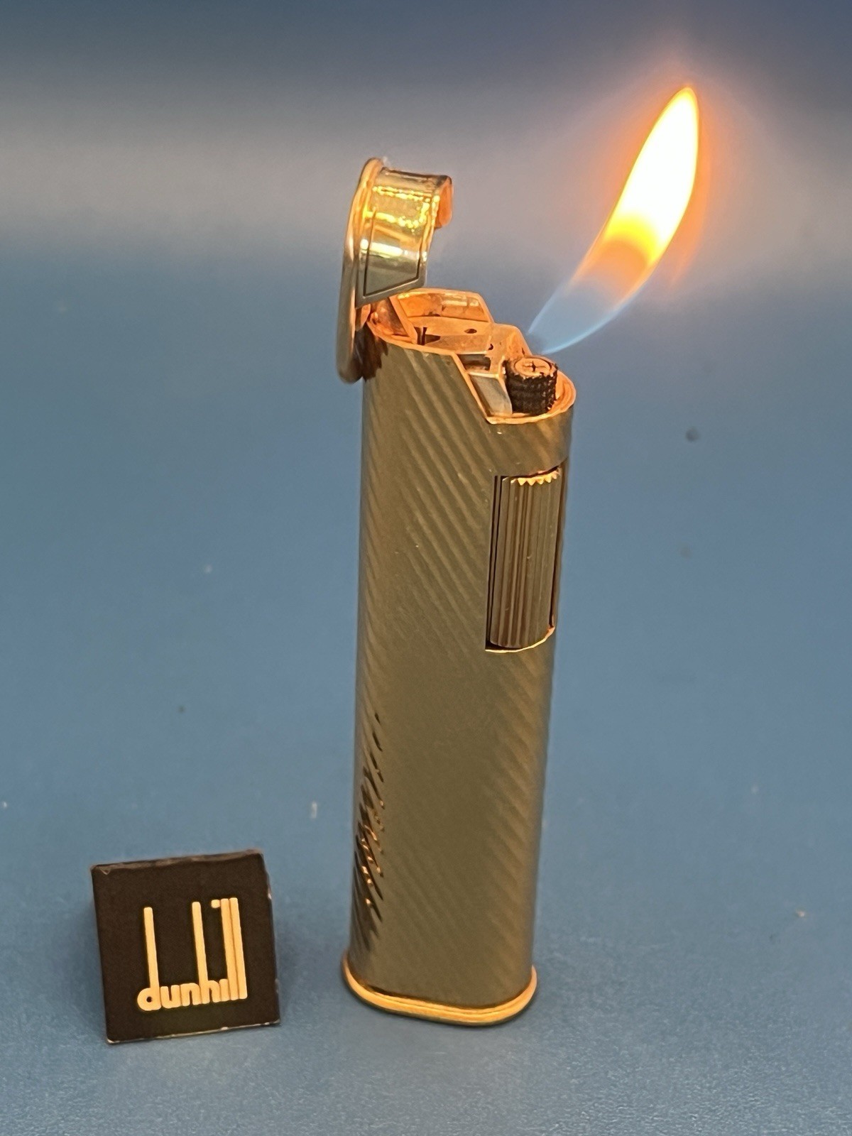 1970's Dunhill Gold Plated TWIST LINE DRESS Lighter, Warrantied 1970's Dunhill Gold Plated TWIST LINE DRESS Lighter, Warrantied