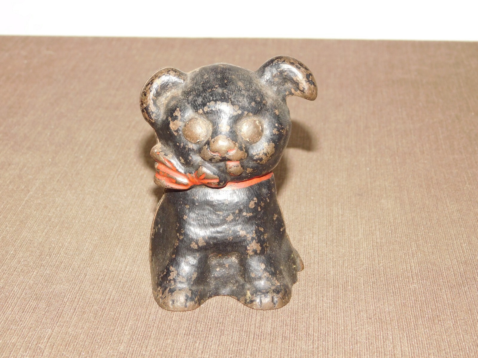 VINTAGE 4" HIGH 1914 HUBLEY CAST IRON PUPPY DOG with RED BOW TIE  COIN BANK