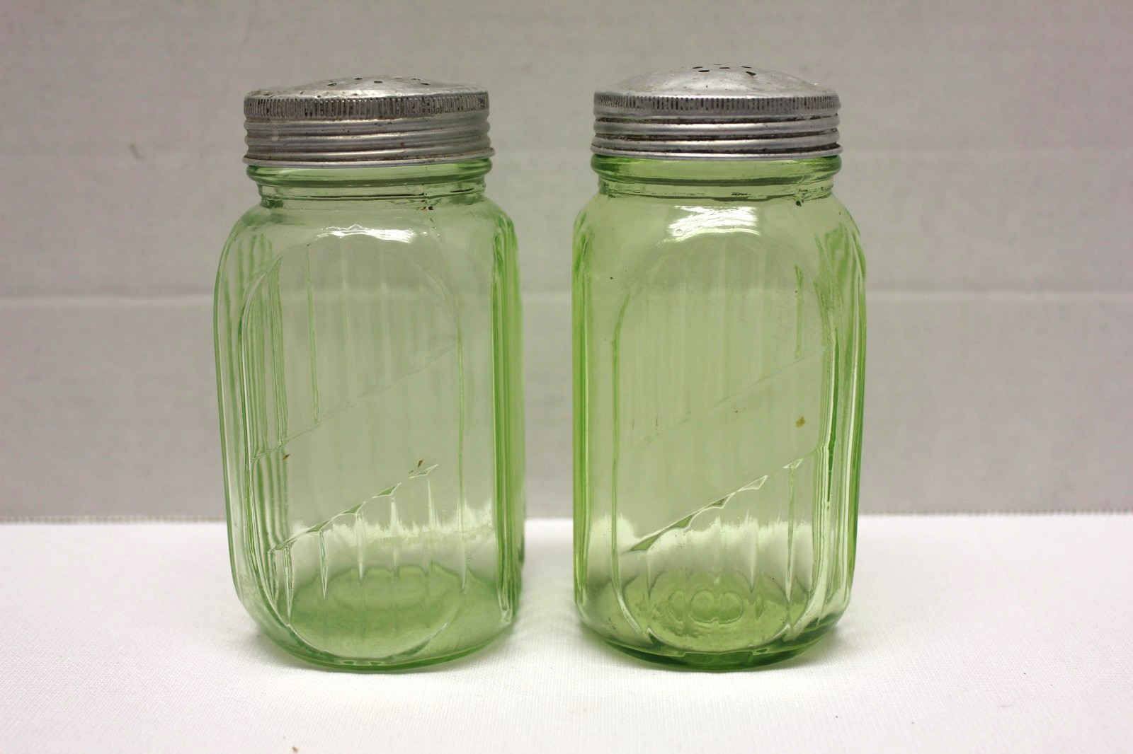 Vintage Hazel Atlas Hoosier Salt/Pepper Shakers Vaseline Glass - Set of 2 Vintage Hazel Atlas Hoosier Salt/Pepper Shakers Vaseline Glass - Set of 2