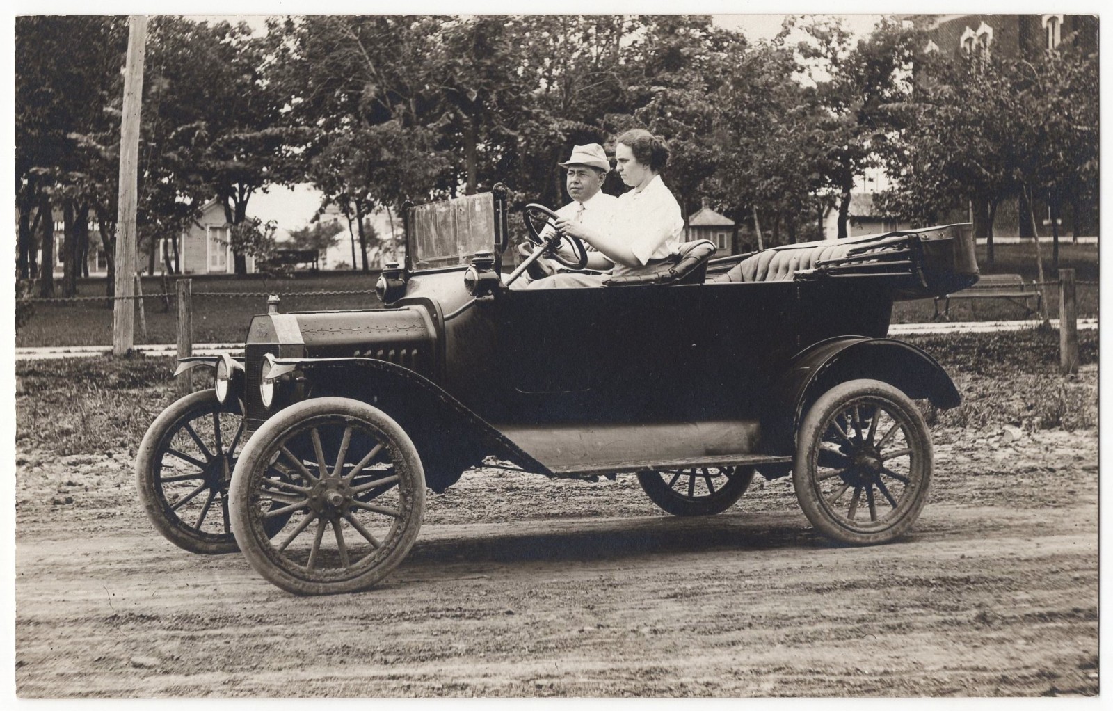 real photo Man Teaching Woman How To Drive Car Automobile antique postcard RPPC real photo Man Teaching Woman How To Drive Car Automobile antique postcard RPPC