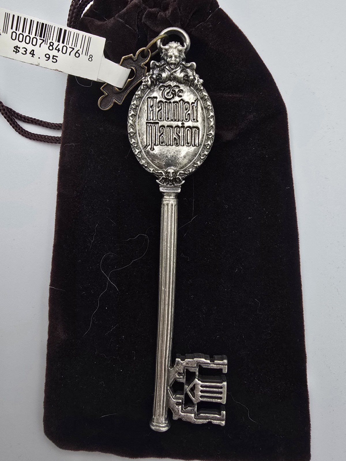 Disney Theme Parks Magic Kingdom Haunted Mansion Key BNWT original bag Disney Theme Parks Magic Kingdom Haunted Mansion Key BNWT original bag