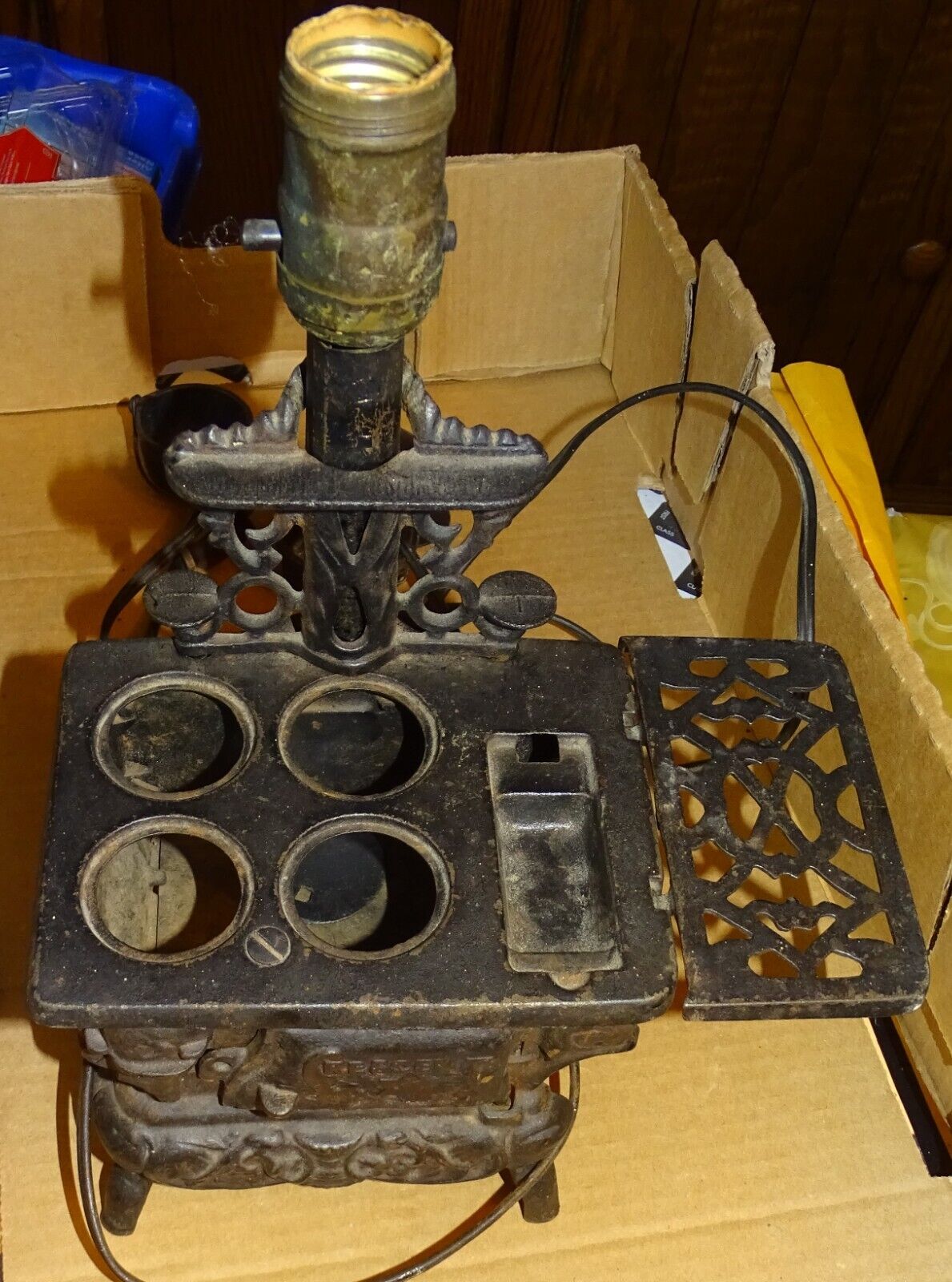 Miniature Antique Cast Iron Crescent Stove Lamp