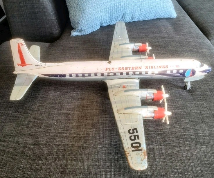 YONEZAWA FLY EASTERN AIRLINES DC-7 TIN TOY AIRPLANE 1950's JAPAN-24" wing span YONEZAWA FLY EASTERN AIRLINES DC-7 TIN TOY AIRPLANE 1950's JAPAN-24" wing span