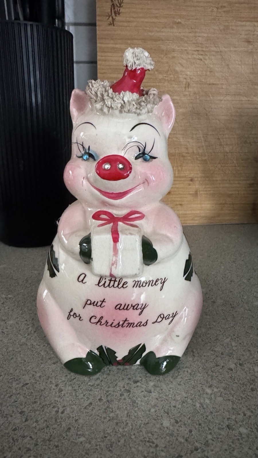 A vintage 1950s Kreiss ceramic Christmas piggy bank with rhinestone eyes. A vintage 1950s Kreiss ceramic Christmas piggy bank with rhinestone eyes.
