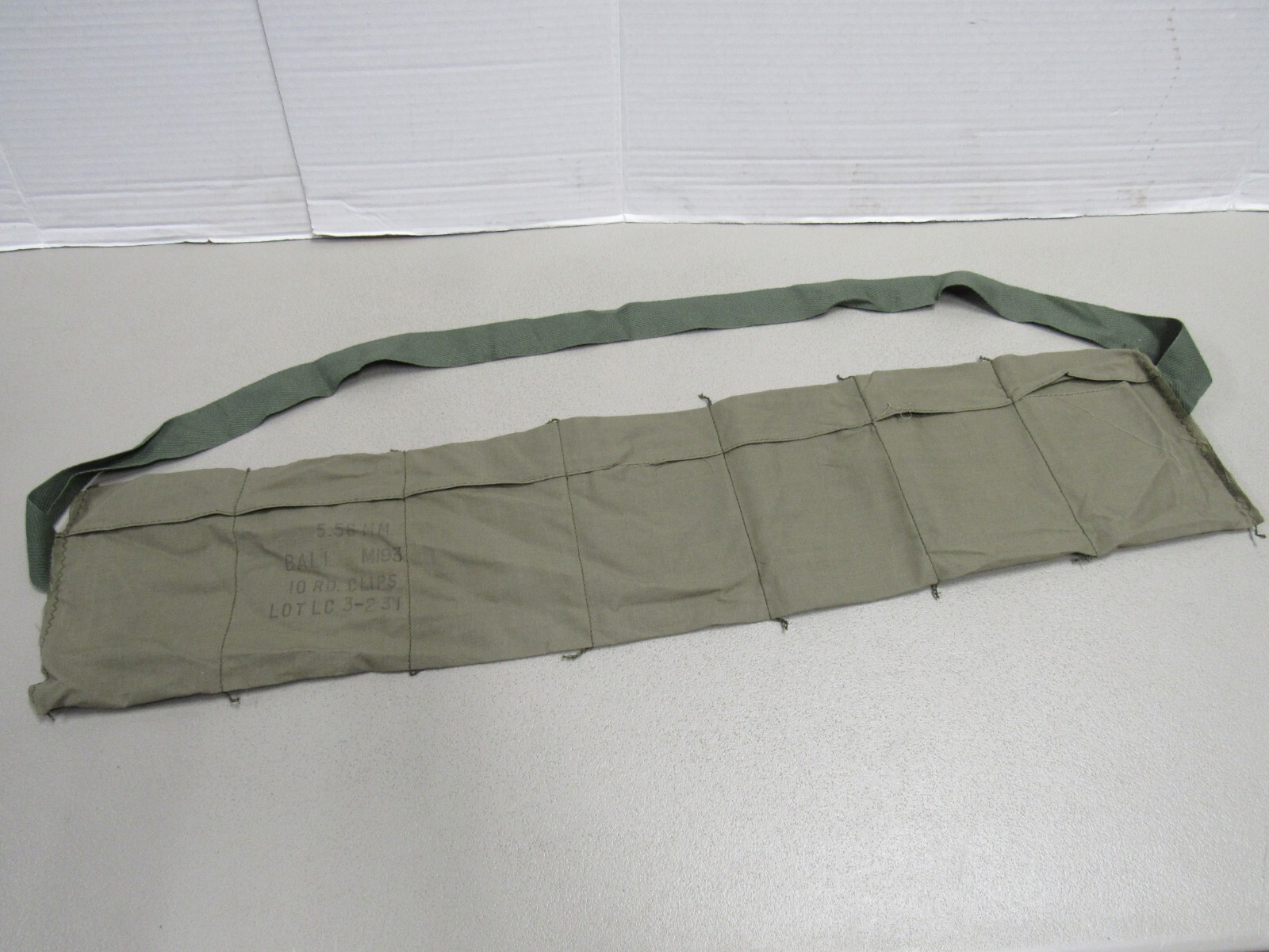 US VIETNAM ERA 7 POCKET AMMO BANDOLIER 1974 DATED UNISSUED US ARMY USMC 223 US VIETNAM ERA 7 POCKET AMMO BANDOLIER 1974 DATED UNISSUED US ARMY USMC 223