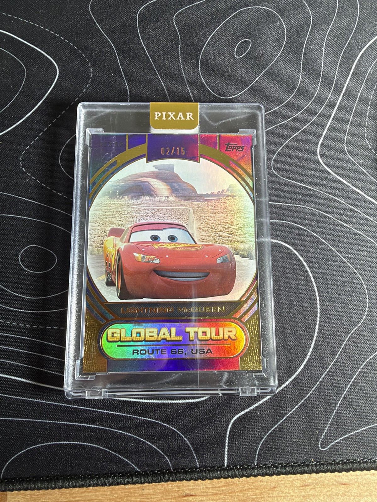 Lightning McQueen 2025 Topps Pixar Gold Global Tour Purple 02/15 Encased Lightning McQueen 2025 Topps Pixar Gold Global Tour Purple 02/15 Encased