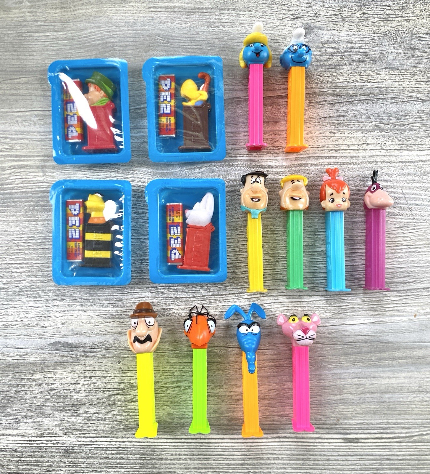 Vintage PEZ Lot Pink Panther Flinstones Smurfs & General Mills Cereal Set Vintage PEZ Lot Pink Panther Flinstones Smurfs & General Mills Cereal Set