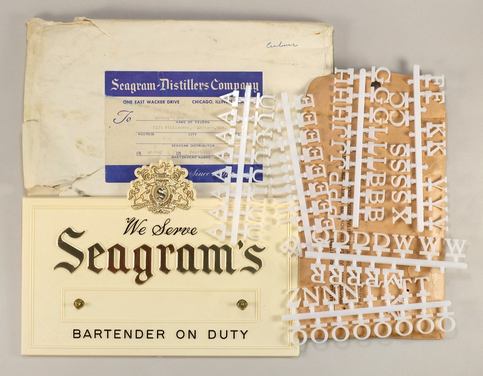Seagram's Distillers Vintage 1960s Bartender on Duty Sign w/ Letters & Envelopes Seagram's Distillers Vintage 1960s Bartender on Duty Sign w/ Letters & Envelopes