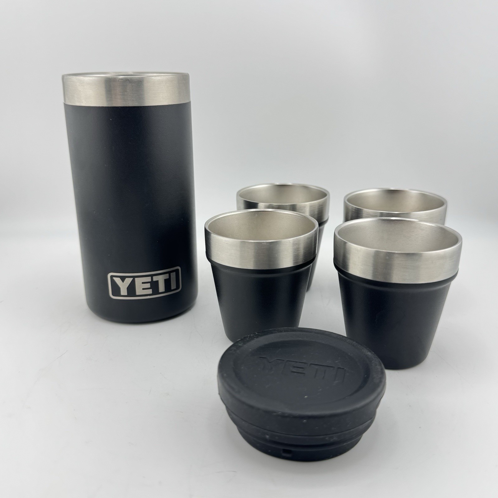 YETI Black Shot Glasses Set of 4 w/ Lidded Sleeve Holder (Authentic Yeti) Clean YETI Black Shot Glasses Set of 4 w/ Lidded Sleeve Holder (Authentic Yeti) Clean